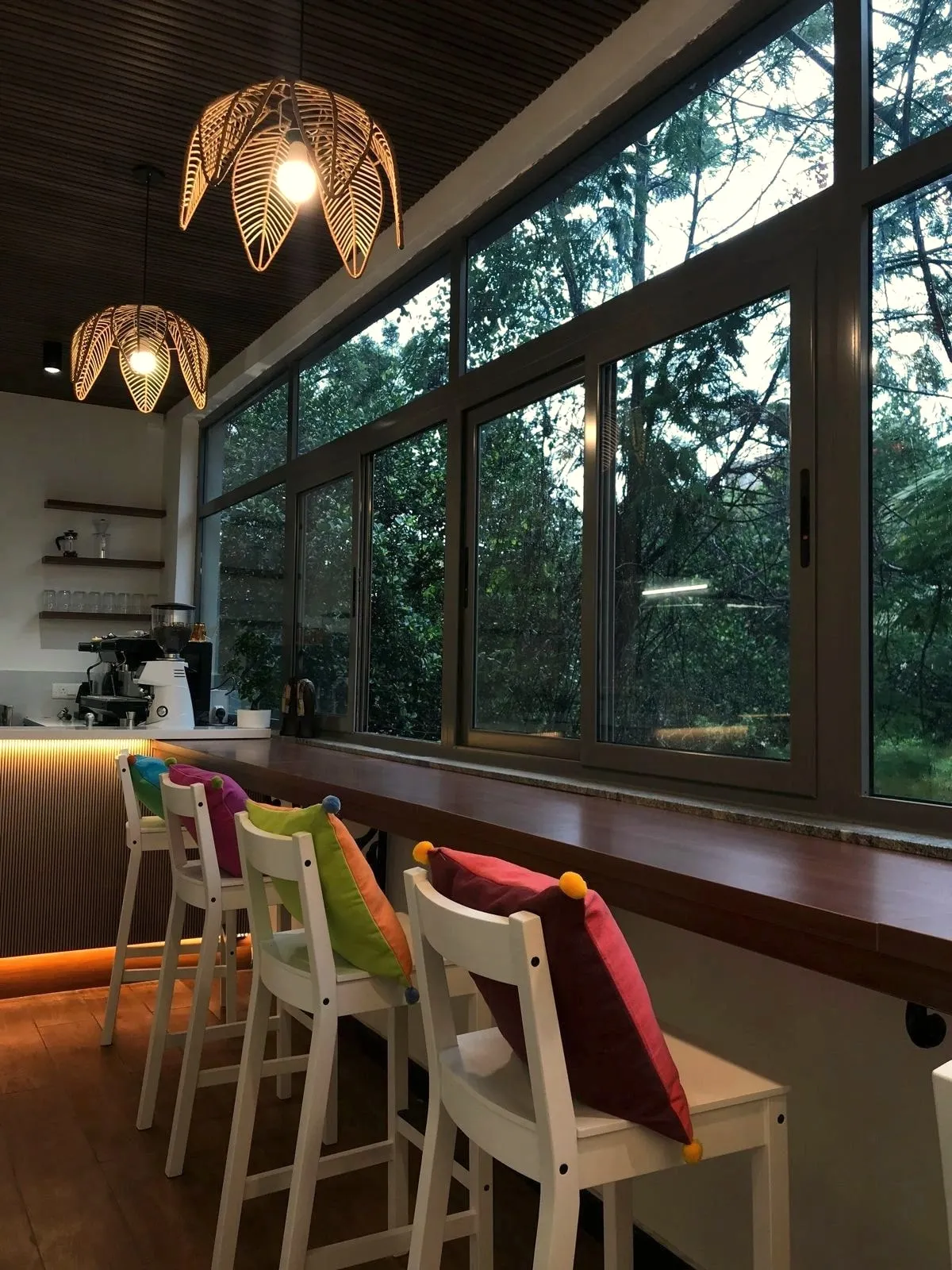 Café Fiori window bar with woven pendant lights