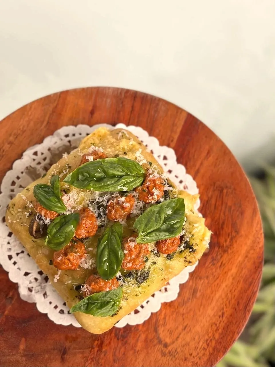 Savoury tart topped with tomato and fresh basil