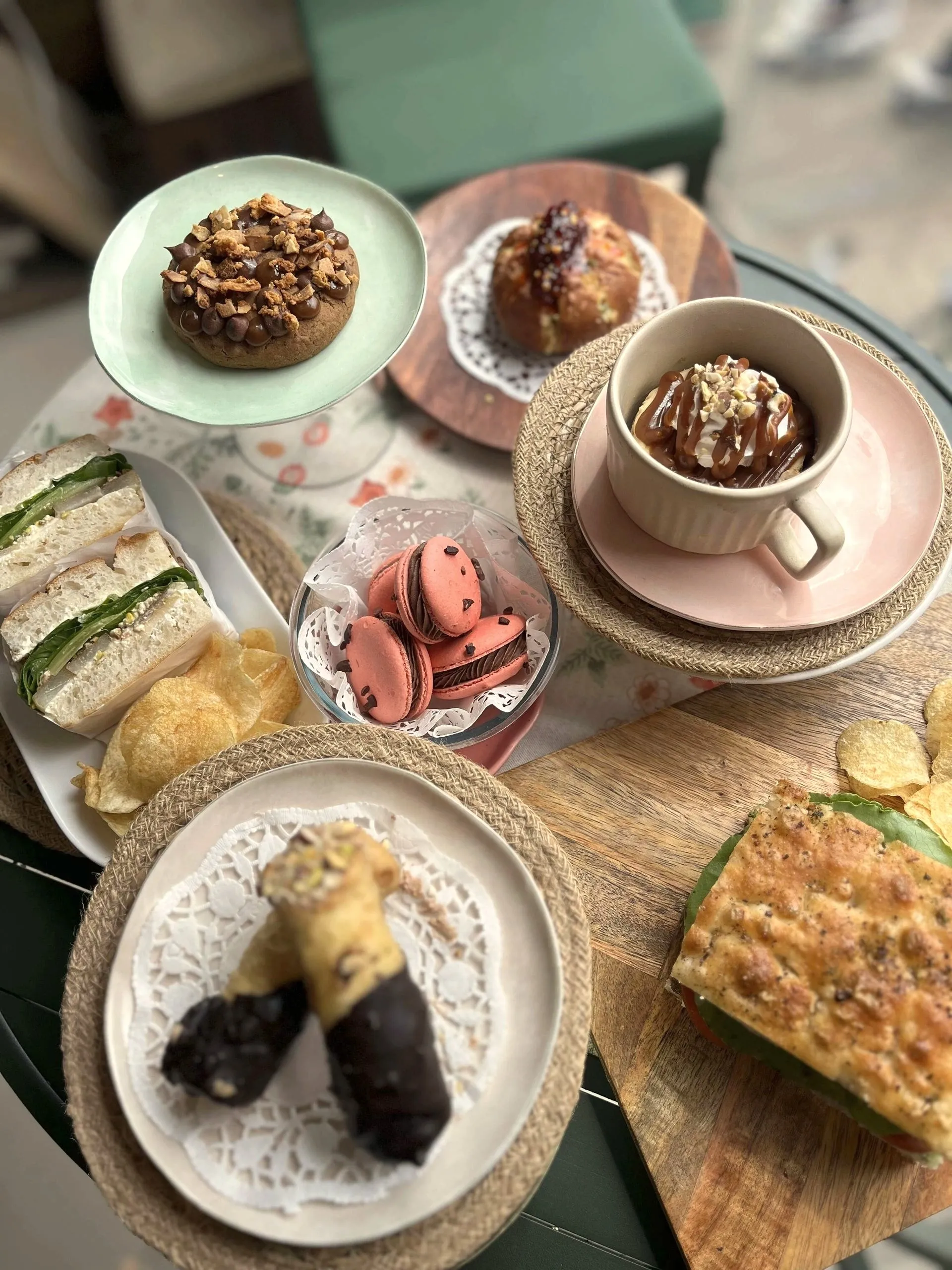 Table of Fiori Studio bakes: sandwiches, macarons, tarts and dessert cups
